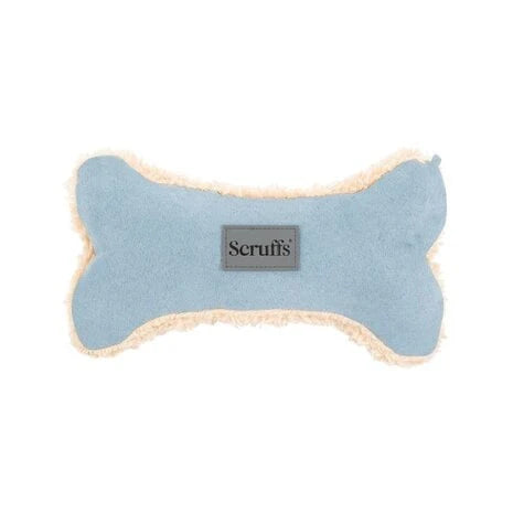 gioco a forma di osso abbinato alla coperta azzurra per cani